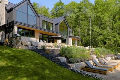 Contemporary Muskoka waterfront estate among mature trees